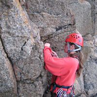 Katie Leading at Halldrine Cove (Roger Dyke)