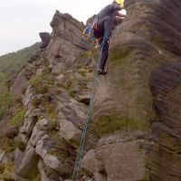 Andy topping out on Rotunda Buttres (Peter Walker)