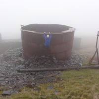 Dave Wylie bouldering on the water tank (Andy Stratford)