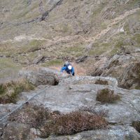 Bob Kelly topping out on P6 Main Wall, Cyrn Las (Colin Maddison)