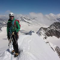 Steve, Monch summit, with the descent down the snow crest to the right (Andy Stratford)