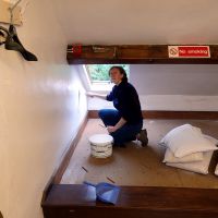 Laura Collier painting the dorm - Ty Powdwr (Dave Wylie)