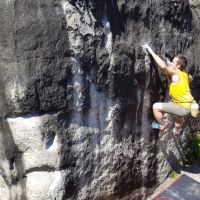 Gareth stretching for a hold at Bas Cuvier (Daniel O'Brien)