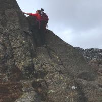 Fiona in action scrambling on Daear Dhu scramble - Moel Siabod (Emily Pitts)