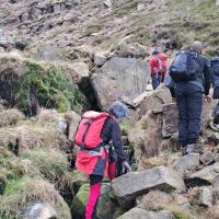 The group heads up into Nether Red Brook (David Rainsbury)