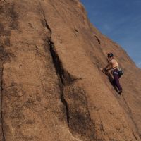 Phoebe leading Mittelweg (Arista) on the amazing grippy granite of Tazka South Dome