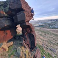 Mirek Steadman leading Flying Buttress at sunset (Andy Stratford)