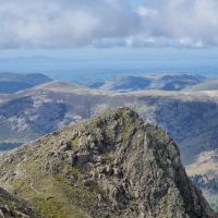 Matt sat on Steeple after climbing Steeple Buttress