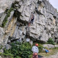 Frankie fighting for the 4th bolt on Cave and Crag, 7a