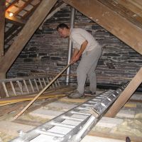 Mark preparing new soffits (Chris Williams)